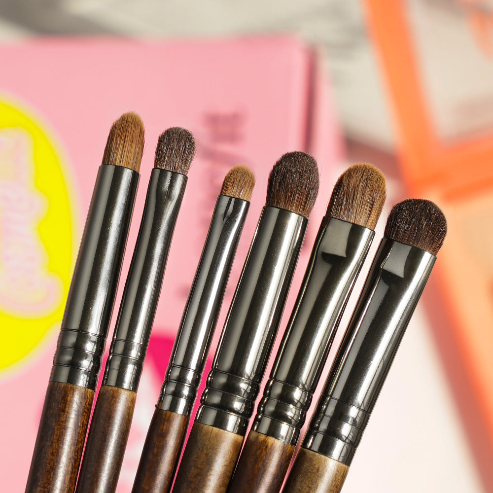 Applying Handcrafted Wood Handle Brush – wool bristles for flawless makeup