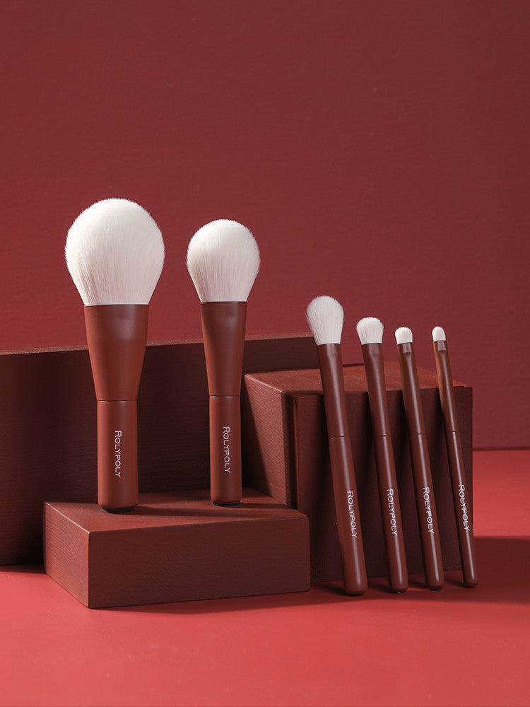 Solid wood handle brushes.