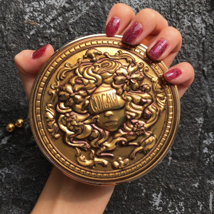 Grecian Odyssey Palette in ornate gold case.
