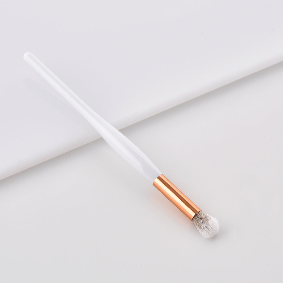 Eyebrow Brush with gold mouth tube in 11-piece What Makeup Brush set