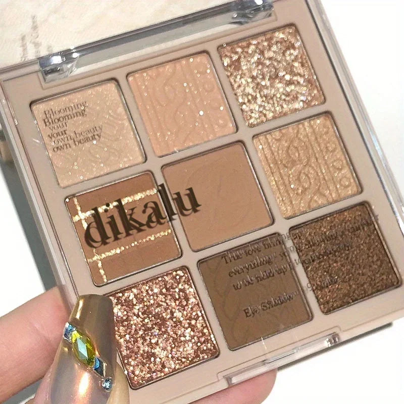 9-Color Eyeshadow Palette with matte and shimmer brown shades.