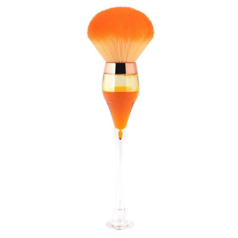 Long-handled wine glass makeup brush standing as a chic vanity ornament