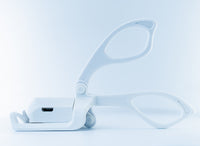 White eyeglasses on a light blue background