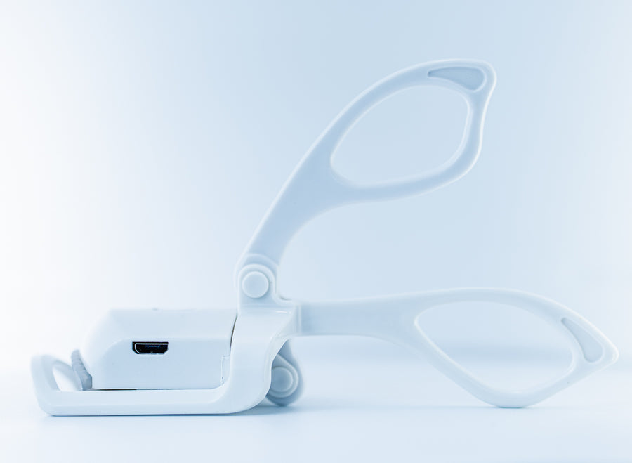 White eyeglasses on a light blue background