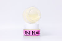 Cosmetic product with 'Luminar' label on a white background