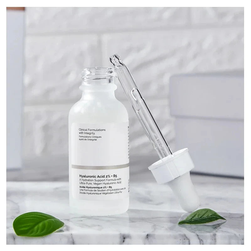 HydraGlow HA & B5 Serum bottle on sleek surface.