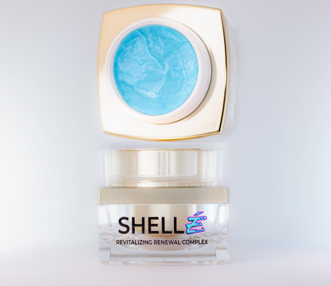 Skincare product with blue gel and 'ShellÉ' branding on a light gray background