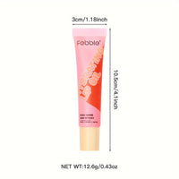 Woman applying High Shine Lip Oil with precision applicator.